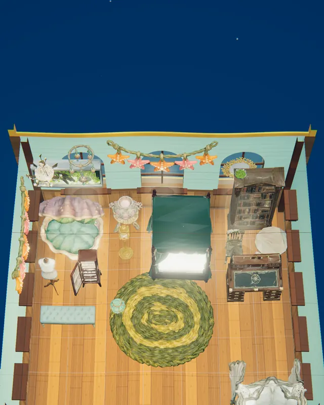 Her cabin seen from above while decorating: a bed, a shell armchair, shelves and a round rug